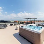 The Skyline Penthouse By Belmont Realty *